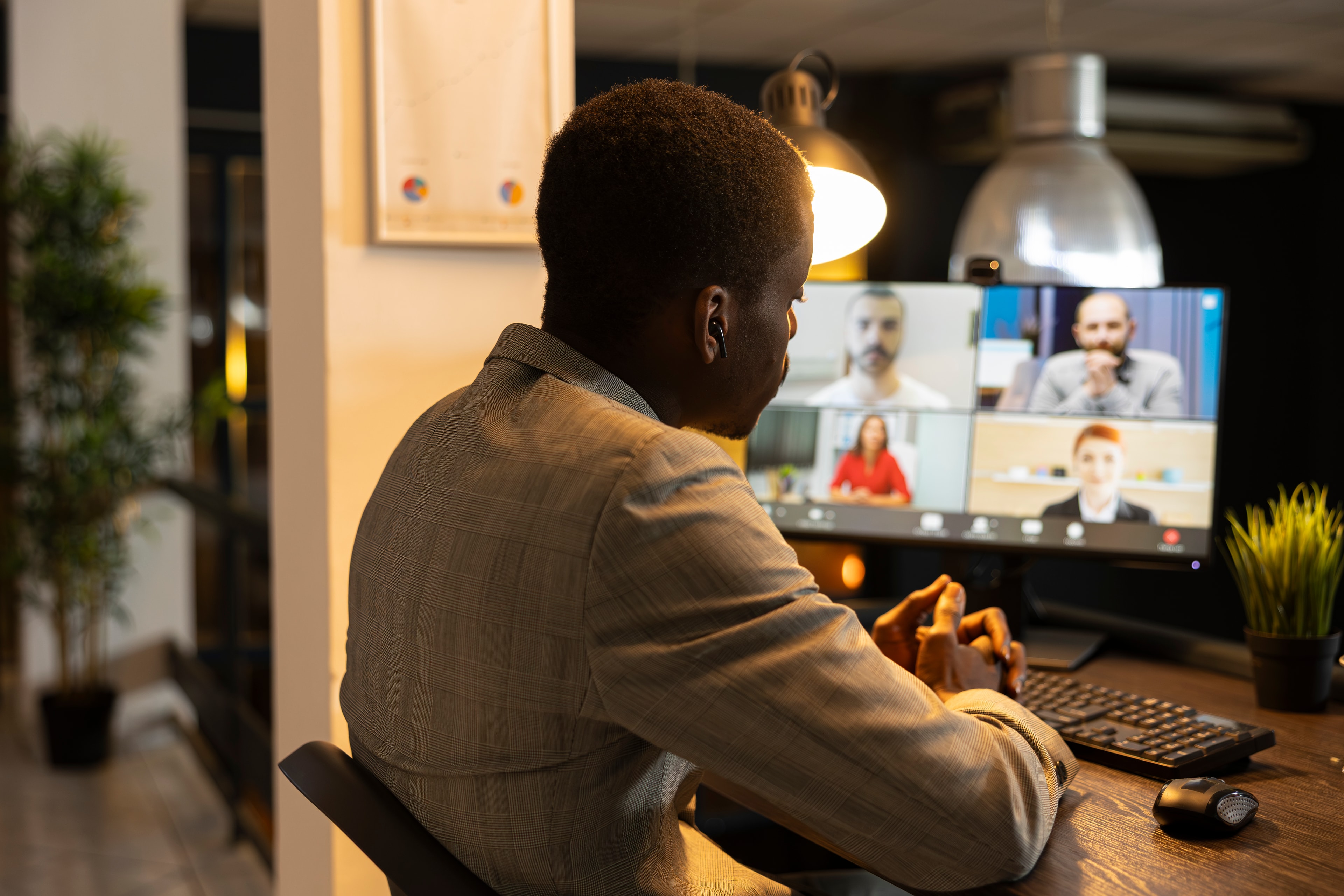 A practitioner joining a secure video consultation from their desk